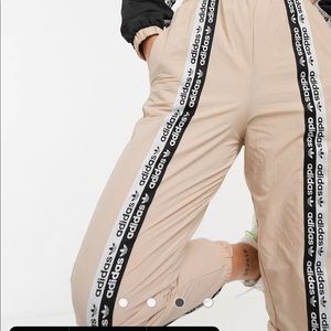Adidas Originals RYV taping track pants in blush
